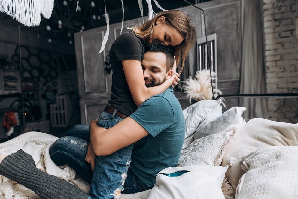a woman hugs a man who has increased potency
